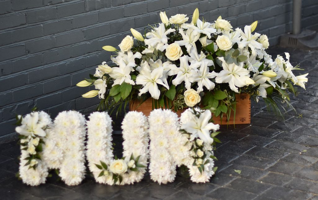 lily funeral spray